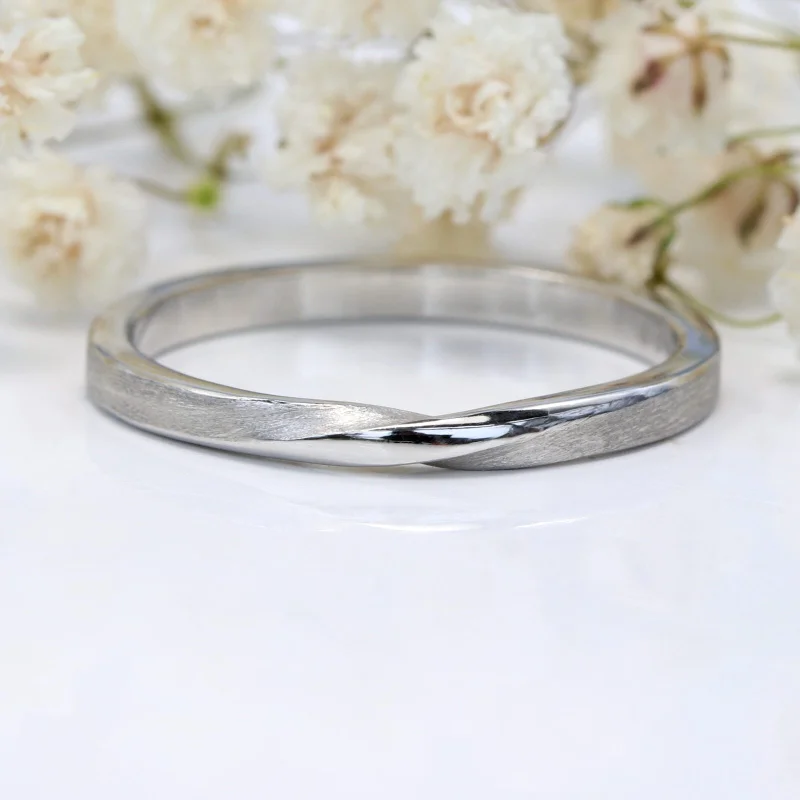 Matching Wedding Bands for a Coordinated Look950 Platinum 2mm Spun Silk Slim Ribbon Twist Wedding Ring