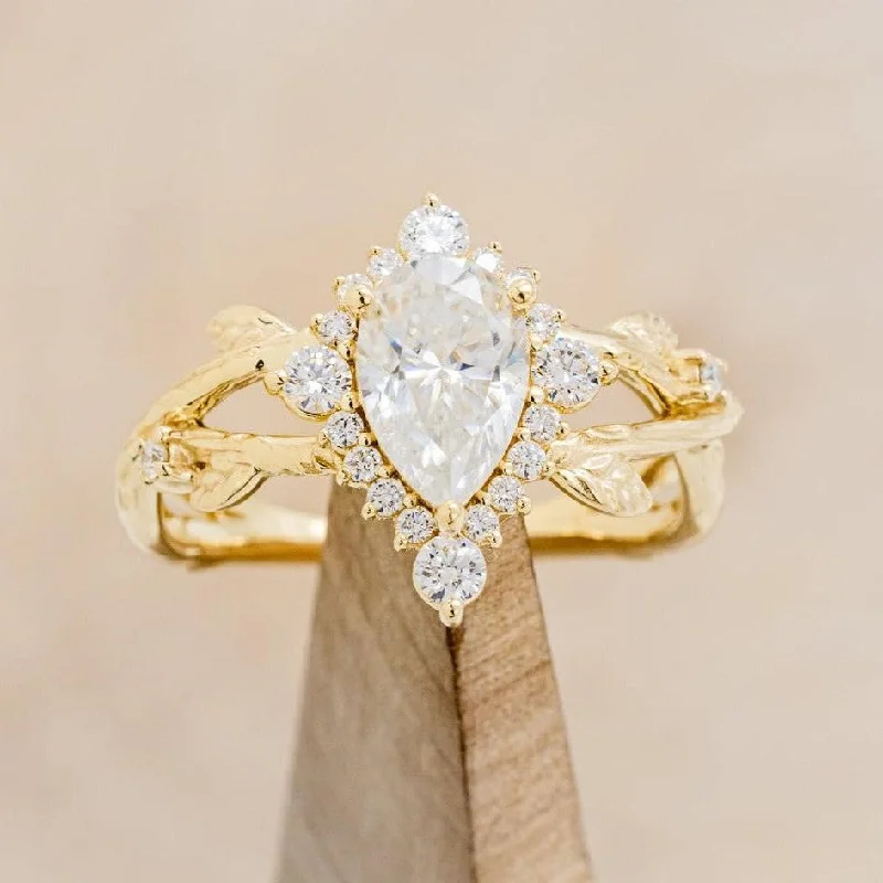 "ARTEMIS ON THE VINE DIVINE" - PEAR MOISSANITE ENGAGEMENT RING WITH DIAMOND ACCENTS & A BRANCH-STYLE BAND