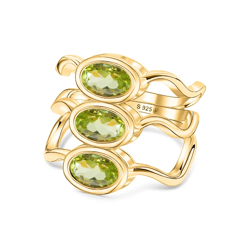 Sapphire Gemstone Rings in a Cathedral SettingPeridot Ring