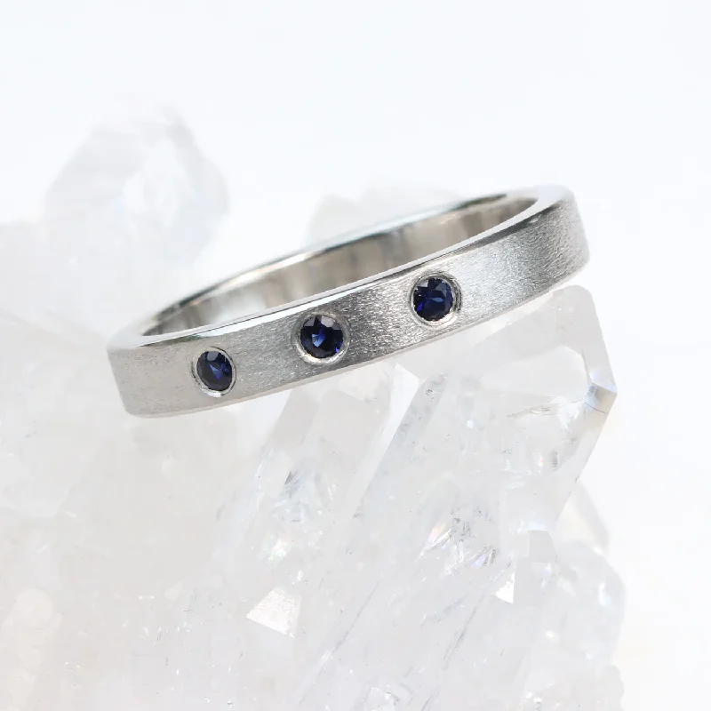 Two - Tone Wedding Bands in Gold and PlatinumCustom Dark Blue Sapphire Wedding Ring in 950 Platinum