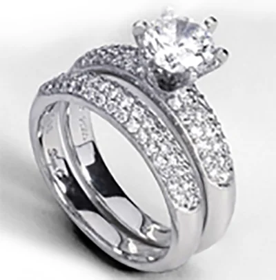 Solitaire Diamond Rings in Platinum SettingsWedding Set in 18k Gold with Diamonds