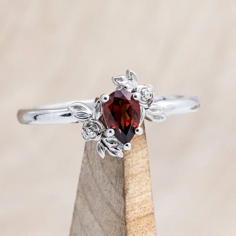 "ROSA" PETITE - PEAR CUT MOZAMBIQUE GARNET ENGAGEMENT RING WITH FLOWER ACCENTS