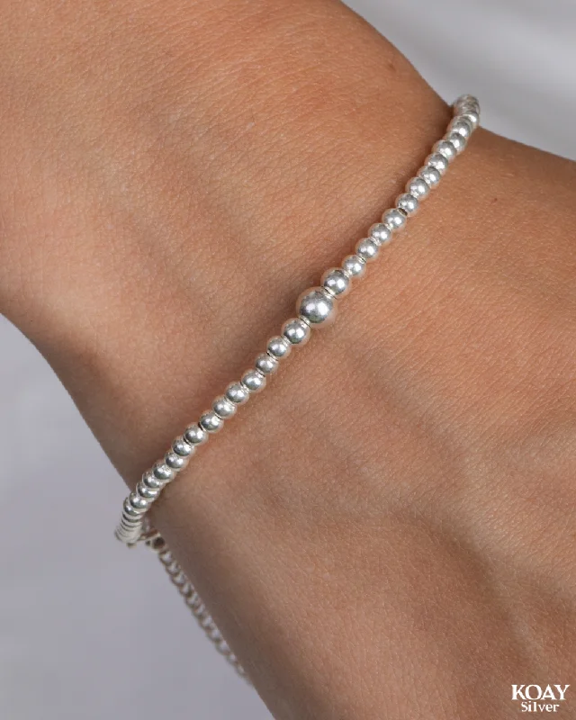 Stackable Bangle Sets for a Trendy LookSmall balls Bracelet