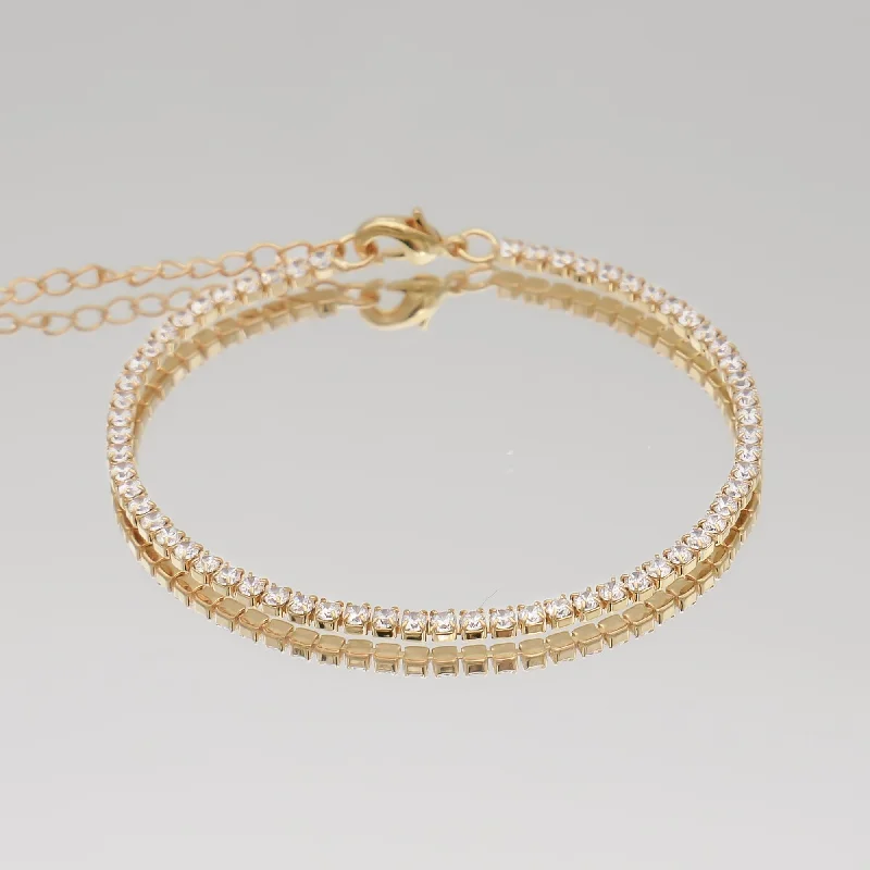 Solid Gold Bangles with Intricate EngravingsIcy Tennis CZ Bracelet