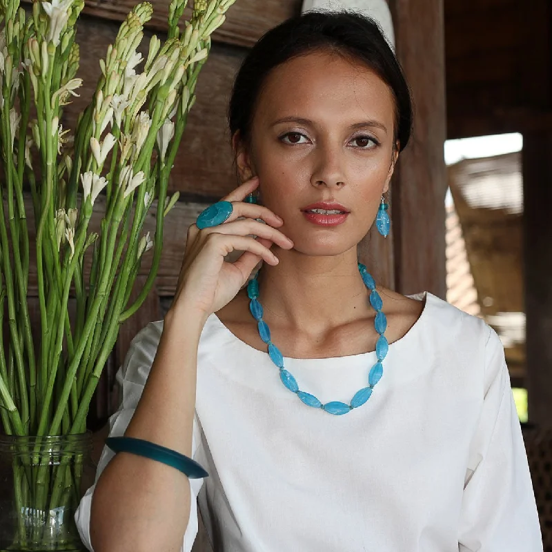 Solid Gold Bangles with Intricate EngravingsAngkor Resin Necklace