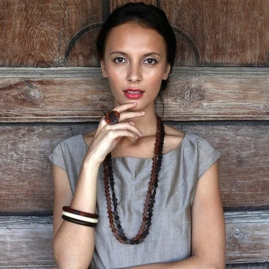 Solid Gold Bangles with Intricate EngravingsDusk Long Resin Necklace