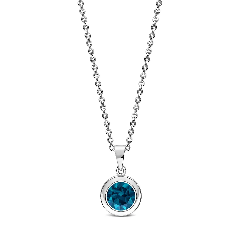 Crystal - Embellished Pendant Necklaces for a Glamorous LookSterling Silver London Blue Topaz 7mm Round Framed Pendant